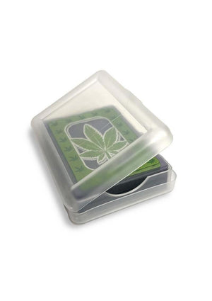 Small transparent container with a green leaf design on a white background